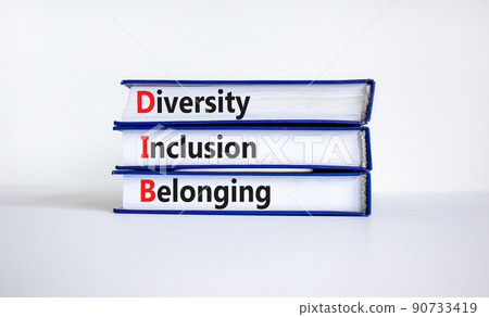 DIB, Diversity, inclusion and belonging symbol. Books with words DIB, diversity, inclusion and belonging on beautiful white background. Business, diversity, inclusion and belonging concept. 90733419