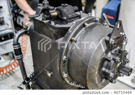 Assembling tractor transmission on the modern tractor factory. Service concept 90733484
