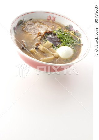 A pork bone soy sauce ramen with menma, boiled egg, all-purpose onion and spicy miso on a large char siu shot on a white background A pork bone soy sauce ramen with menma, boiled egg, all-purpose onion and spicy miso on a large char siu shot on a white background 90738037