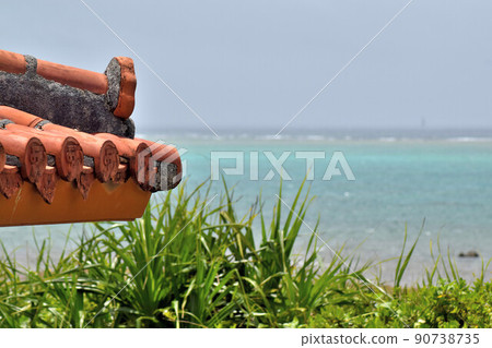 Red tile roof and sea Red tile roof and sea 90738735