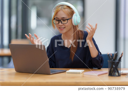 Portrait of Young Asian woman using social media by laptop. Lifestyle ,Shopping online concept. 90738979