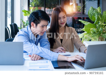 Group of Asian Business people consult advice about finance plan. Account concept. Group of Asian Business people consult advice about finance plan. Account concept. 90739181
