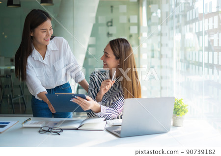 Group of Asian Business people consult advice about finance plan. Account concept. Group of Asian Business people consult advice about finance plan. Account concept. 90739182