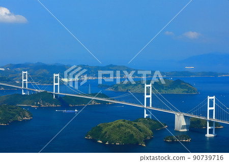 [Ehime Prefecture] View of the Kurushima Kaikyo Bridge in fine weather (Shimanami Kaido) 90739716