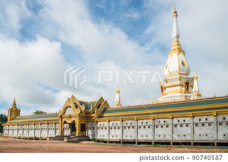 The outer terraces of Phra Maha Chedi Chai Mongkol It is located on the grounds of the Wat Pha Namthip Thep Prasit Vararam, a temple in Roi Et province of Thailand. 90740587