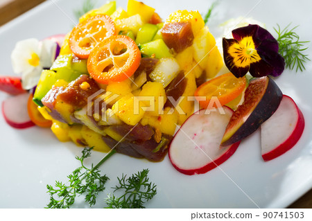 Tuna tartar with mango and avocado 90741503