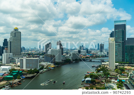 Chao Phraya River with Taksin bridge and building of Bangkok city, Thailand Chao Phraya River with Taksin bridge and building of Bangkok city, Thailand 90742293