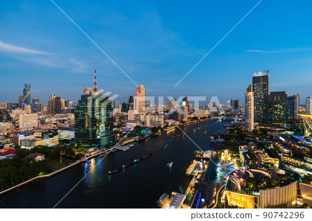 Chao Phraya River with Taksin bridge and building of Bangkok city at twilight, Thailand 90742296