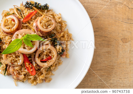 Basil and Spicy Herb Fried Rice with Squid or Octopus Basil and Spicy Herb Fried Rice with Squid or Octopus 90743738