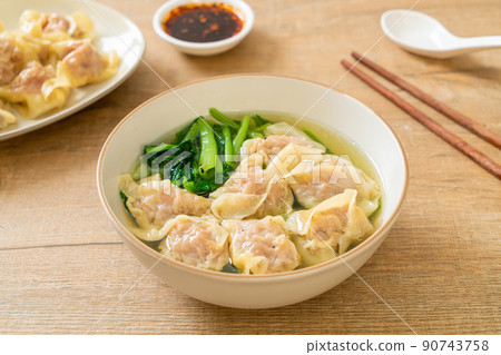 pork wonton soup or pork dumplings soup with vegetable 90743758