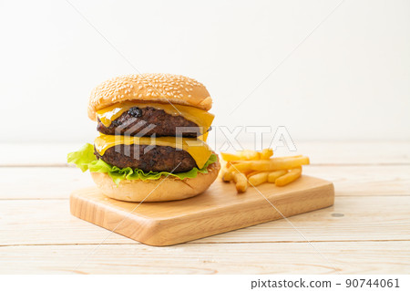 hamburger or beef burgers with cheese and french fries hamburger or beef burgers with cheese and french fries 90744061