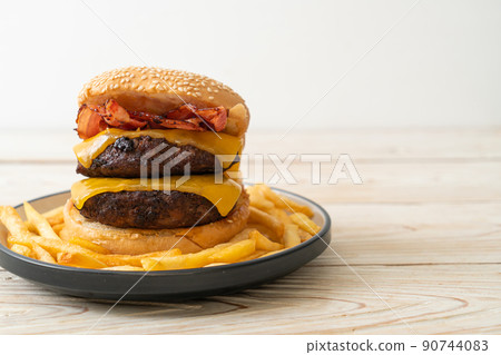 hamburger or beef burgers with cheese and bacon 90744083
