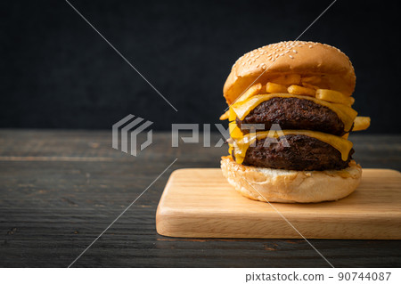 hamburger or beef burgers with cheese and french fries hamburger or beef burgers with cheese and french fries 90744087