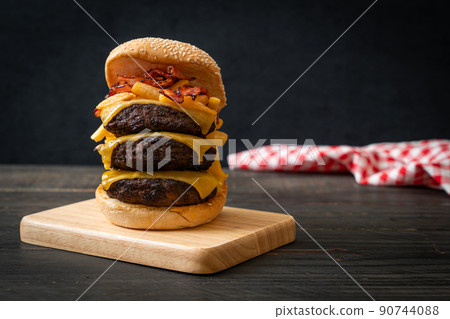 hamburger or beef burgers with cheese, bacon and french fries hamburger or beef burgers with cheese, bacon and french fries 90744088