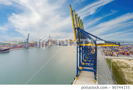 Cargo ship and truck at seaport waiting for container dock crane  shipment harbour loading container boxes import and export commercial trade business logistic and transportation of international. 90744155