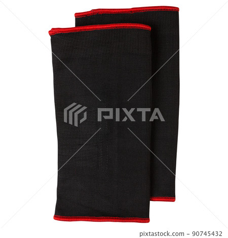 a pair of black sports compression knee pads, on a white background, isolate 90745432
