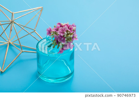 Flower base vase on a light blue background Flower base vase on a light blue background 90746973