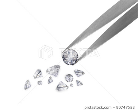 brilliant cut diamond held by tweezers brilliant cut diamond held by tweezers 90747588