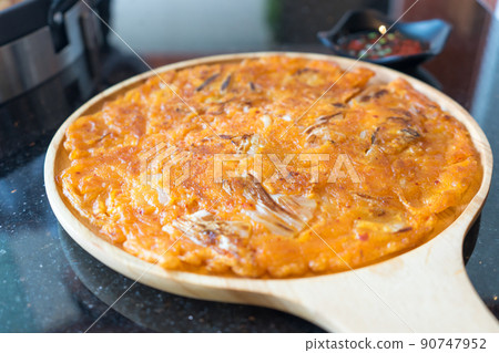 Korean food in modern applied kimchi with pizza merge together. 90747952