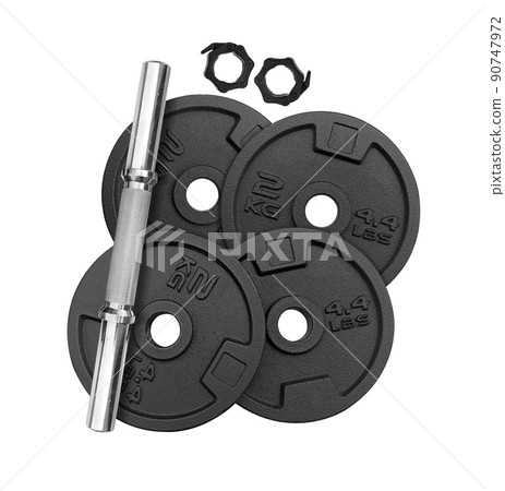 Top view of heavy weight plate with split steel bar on white Top view of heavy weight plate with split steel bar on white 90747972