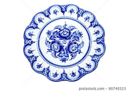 Plate Bowl Dishes Porcelain Ceramic Isolated on white background. Front Top view. Cobalt Blue color traditional folk painting Floral Pattern. Souvenir Decor for home interior of premises. Plate Bowl Dishes Porcelain Ceramic Isolated on white background. Front Top view. Cobalt Blue color traditional folk painting Floral Pattern. Souvenir Decor for home interior of premises. 90748523