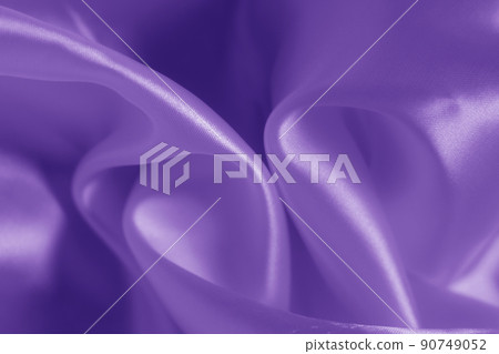 The texture of the proton purple cloth with waves and shrugs. Shiny fabric. The texture of the proton purple cloth with waves and shrugs. Shiny fabric. 90749052
