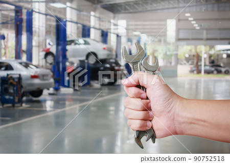 Hand of professional Auto mechanic with wrench Hand of professional Auto mechanic with wrench 90752518