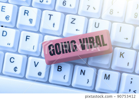 Conceptual display Going Viral. Word Written on image video or link that spreads rapidly through population Lady in suit holding pen symbolizing successful teamwork accomplishments. 90753412