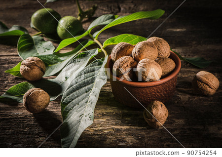 Walnut peas to vintage background. 90754254