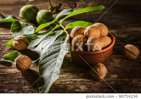 Walnut peas to vintage background. 90754256