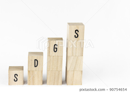 Stacked wooden blocks of SDGs. Image of SDGs Stacked wooden blocks of SDGs. Image of SDGs 90754654