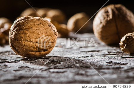 Fresh peanuts in shell top view background Fresh peanuts in shell top view background 90754829