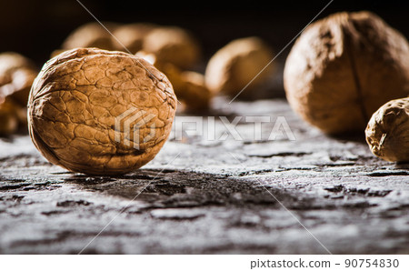 Fresh peanuts in shell top view background Fresh peanuts in shell top view background 90754830