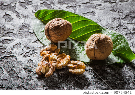 Fresh peanuts in shell top view background Fresh peanuts in shell top view background 90754841