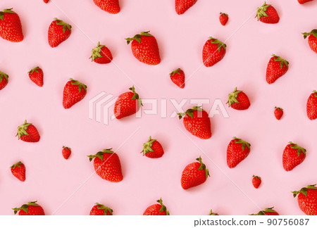 Fresh red strawberry on pink background, top view. Minimalistic scattered berries pattern. Creative food concept. Flat lay, copy space, top view Fresh red strawberry on pink background, top view. Minimalistic scattered berries pattern. Creative food concept. Flat lay, copy space, top view 90756087