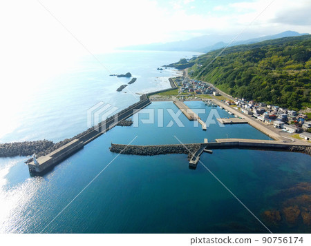 Aerial view of Toyohama fishing port in Otobe-cho, Hokkaido in early summer Aerial view of Toyohama fishing port in Otobe-cho, Hokkaido in early summer 90756174