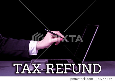 Hand writing sign Tax Refund. Business overview applied when money liability is less than the paid ones -47826 Hand writing sign Tax Refund. Business overview applied when money liability is less than the paid ones -47826 90756456