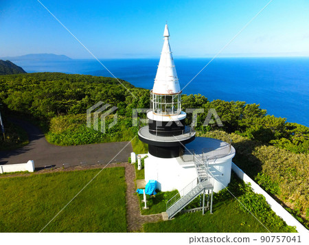 Aerial view of the scenery of Cape Motsuta Lighthouse in Setana Town, Hokkaido in early summer Aerial view of the scenery of Cape Motsuta Lighthouse in Setana Town, Hokkaido in early summer 90757041