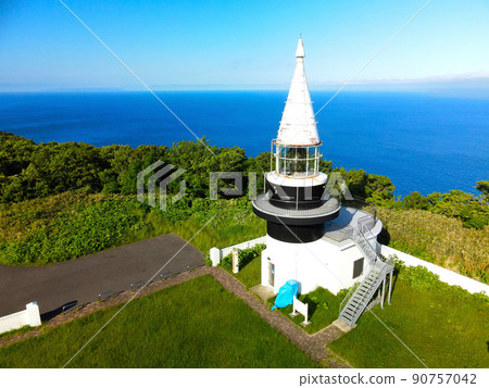 Aerial view of the scenery of Cape Motsuta Lighthouse in Setana Town, Hokkaido in early summer 90757042