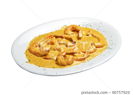 White plate with baked shrimps and curry sausage Isolated 90757920