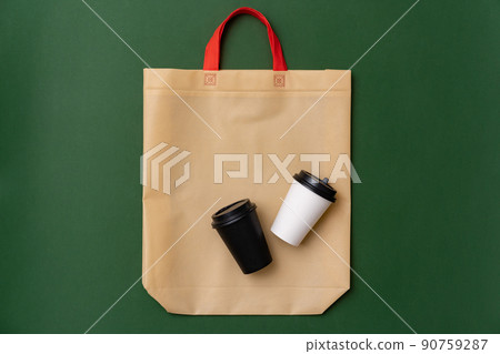 Textile shopping bag and coffee cup flat lay Textile shopping bag and coffee cup flat lay 90759287