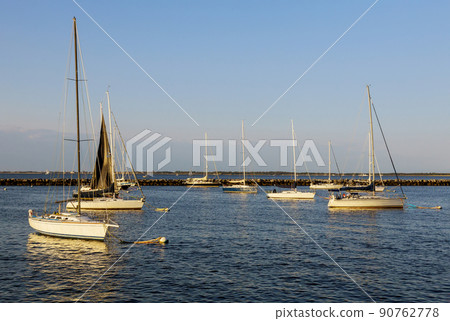 Panoramic view of many boats, yachts and sailboats moored Panoramic view of many boats, yachts and sailboats moored 90762778