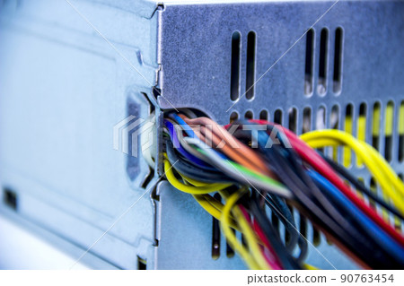 the power supply for the computer on white background 90763454