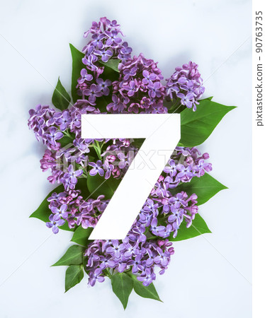 number seven with lilac flowers, Top view number seven with lilac flowers, Top view 90763735