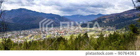 the panoramic aerial view of Skole town in Carpathian mountains, national park Skolivski beskidy, Ukraine the panoramic aerial view of Skole town in Carpathian mountains, national park Skolivski beskidy, Ukraine 90764361
