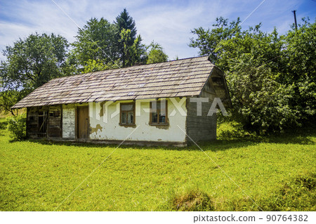 an old authentic Ukrainian village house 90764382