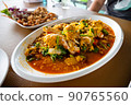 Fried crab in yellow curry , Stir-fried crab curry. 90765560