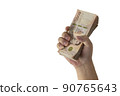 Image of a man holding a large number of banknotes with his right hand (Thai banknotes)  ,with Clipping Path. 90765643
