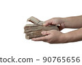 A picture of a hand holding a large amount of money in front of her ,with Clipping Path. 90765656