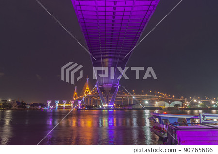Bhumibol Bridge, Chao Phraya River Bridge. Turn on the lights in many colors at night. 90765686